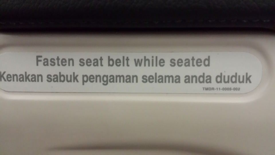 Fasten Seat Belt Transaltion in Indonesian Kenakan Sabuk Pengaman Selama Anda Duduk