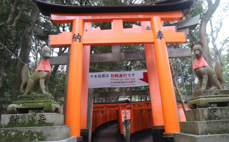 Foxes Statues At The Fushimi Inari Shrine
